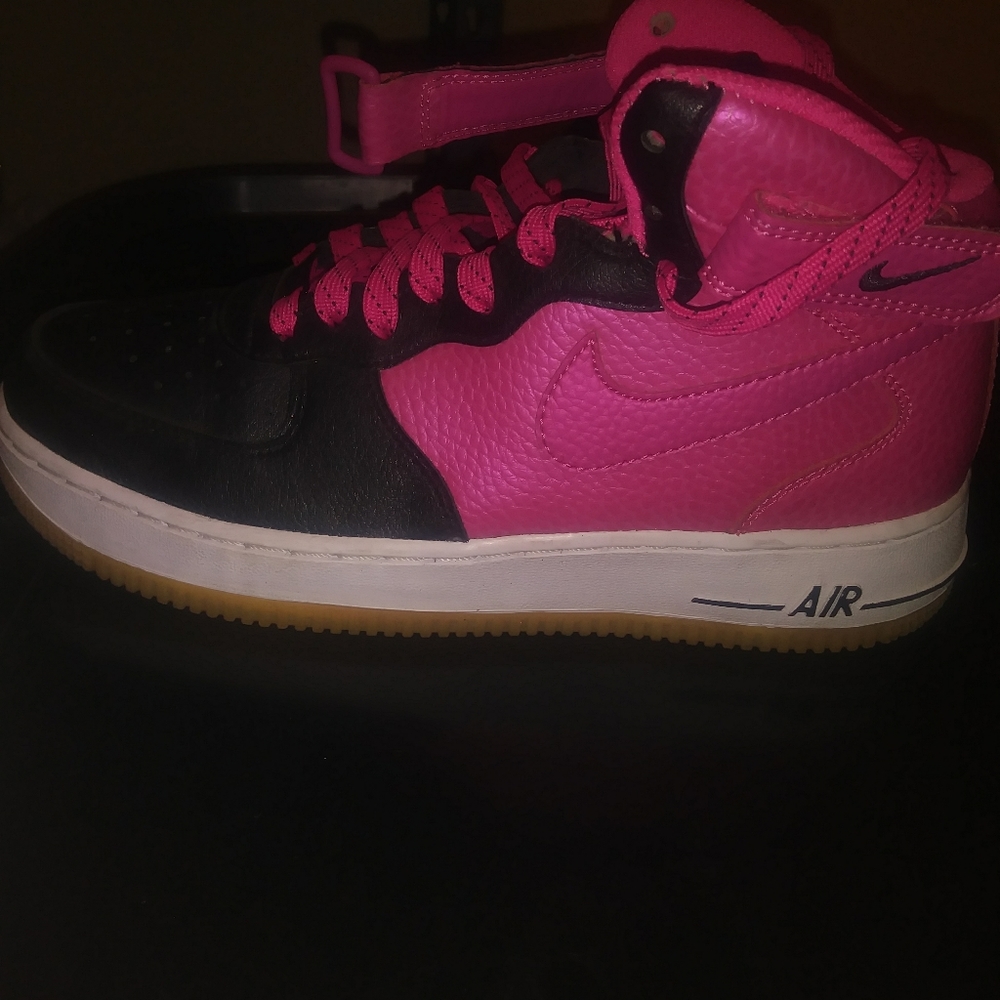 Pink and black Nikes